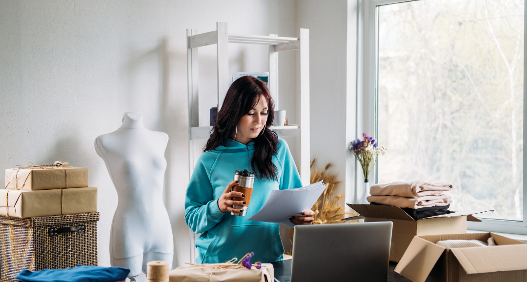 Self-employed business owner reviewing self-employed mortgage Ontario options
